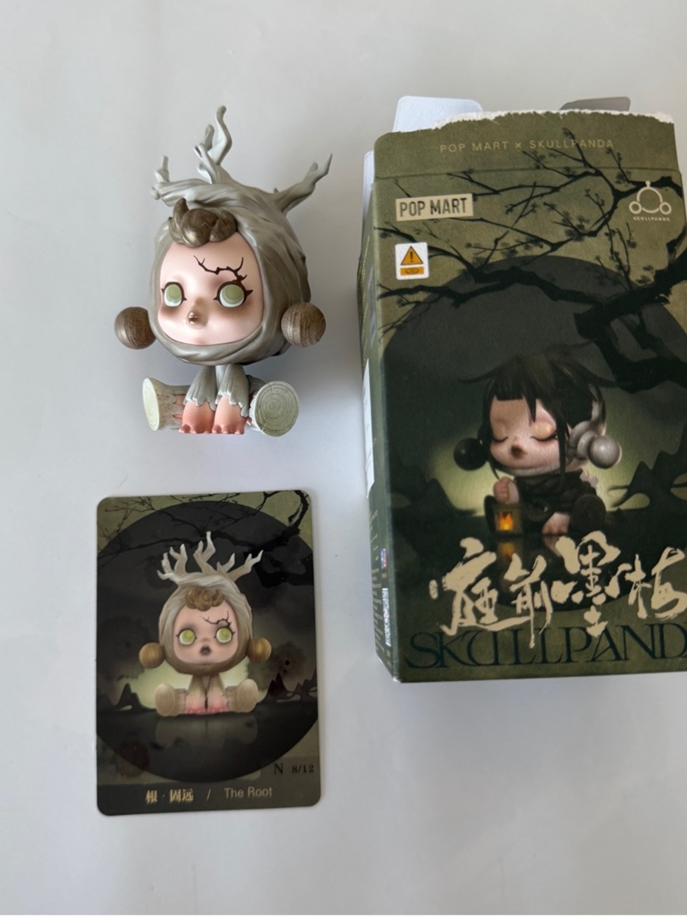 Pop Mart skull panda the ink plum blossom series: The Root